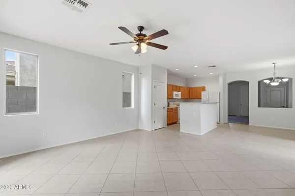 a view of a livingroom with a kitchen