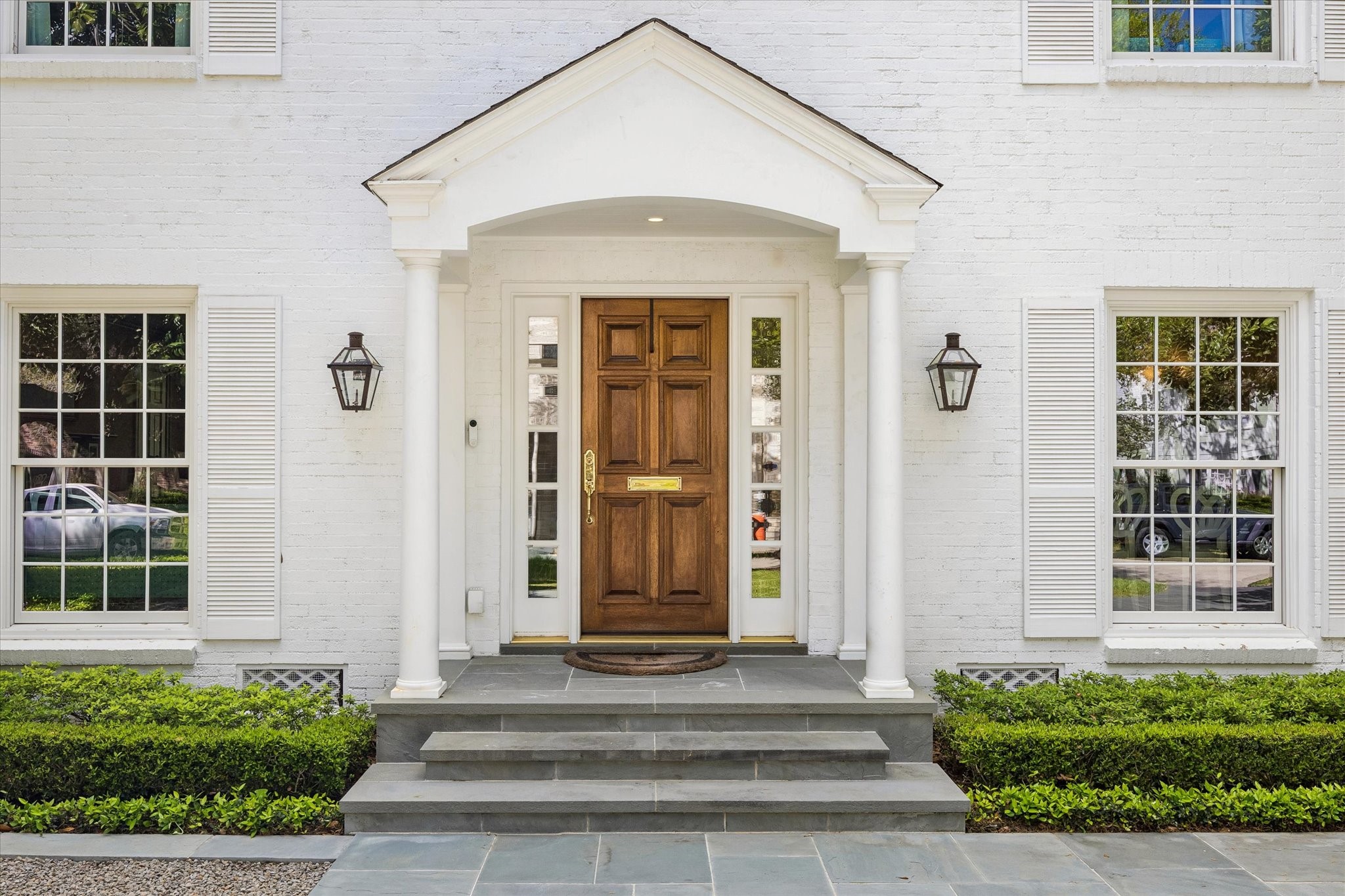2153 Looscan Lane Houston, TX 77019 - Photo 4 of 48 A welcoming front porch flanked by gas lanterns
