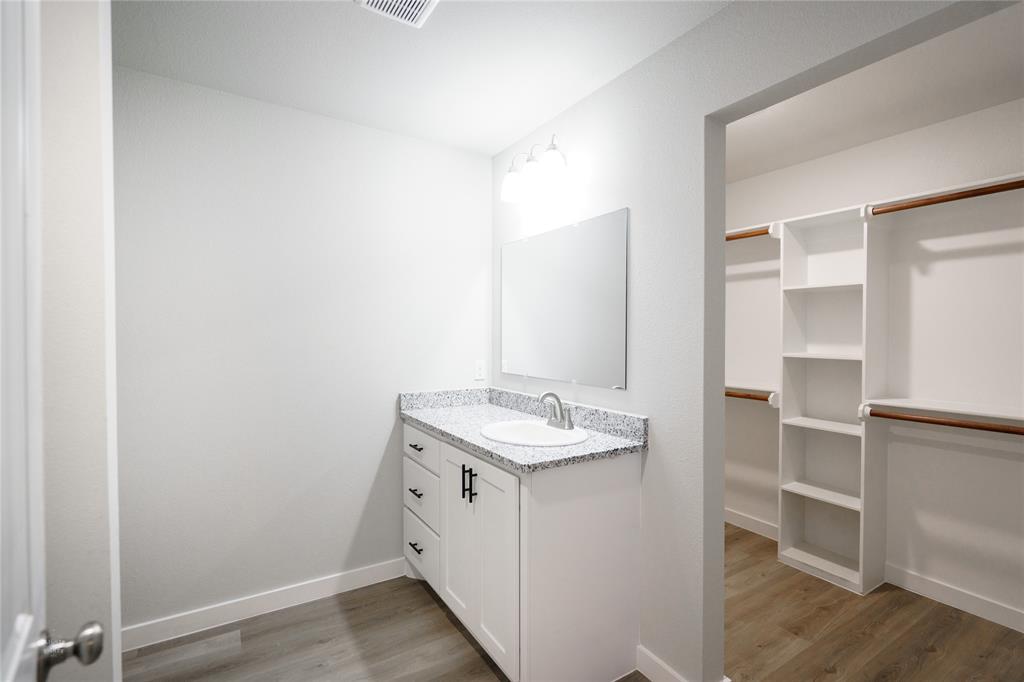 2610 Roman Lane Abilene, TX 79606 - Photo 11 of 17 a utility room with cabinets washer and dryer