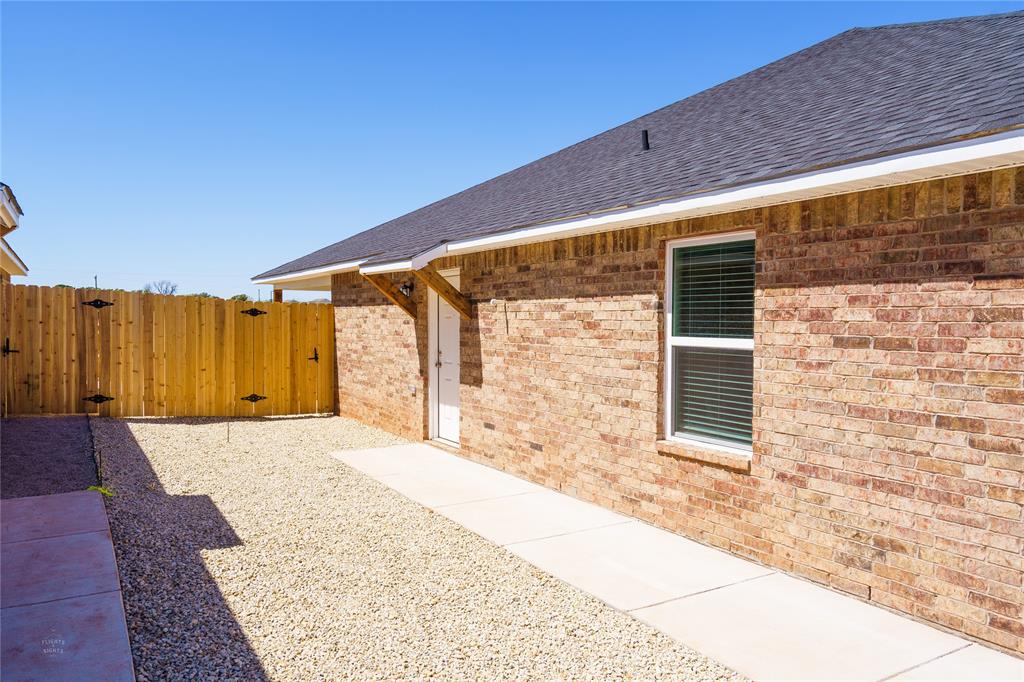 2610 Roman Lane Abilene, TX 79606 - Photo 4 of 17 a backyard of a house