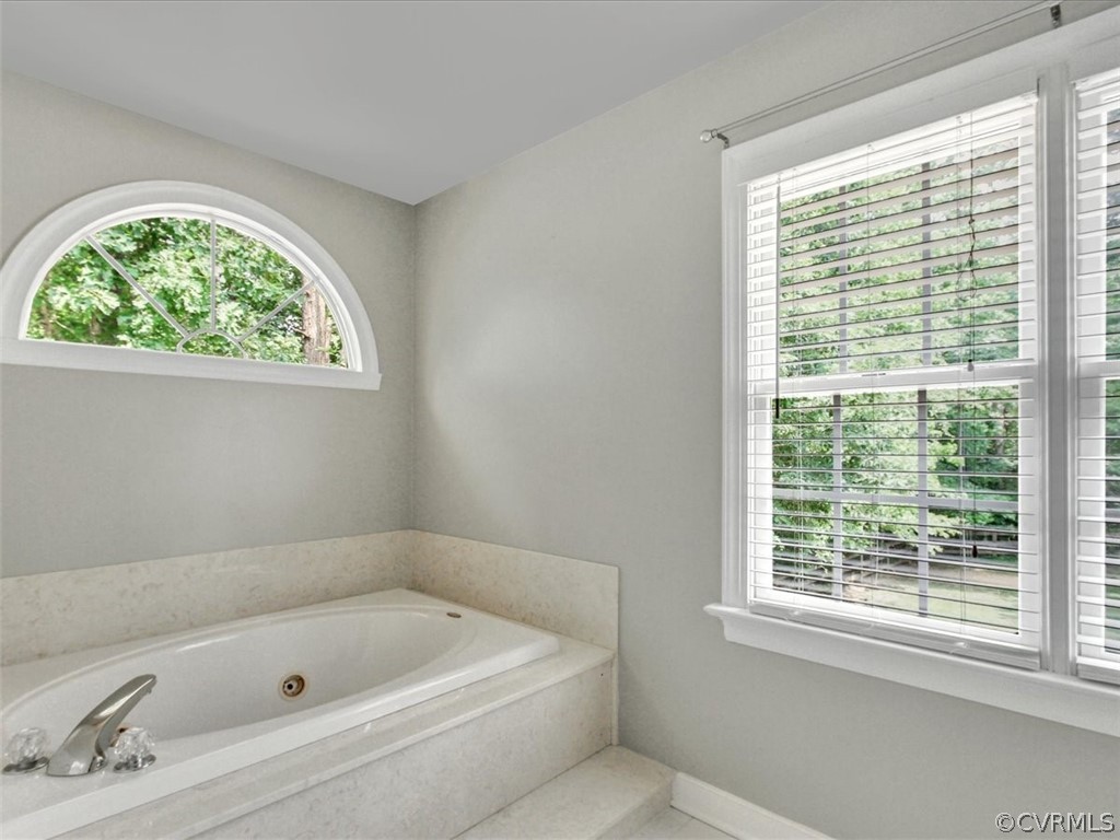 13110 Carters Way Road Chesterfield, VA 23838 - Photo 21 of 31 a bathroom with a tub a window and a shower
