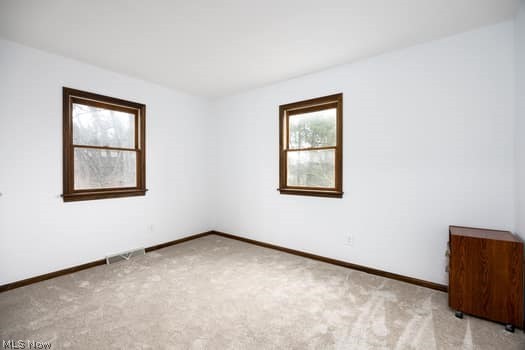 4293 Good Road Seville, OH 44273 - Photo 26 of 35 Carpeted empty room featuring baseboards