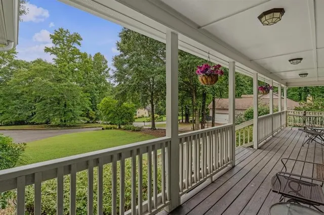 a view of a porch and garden