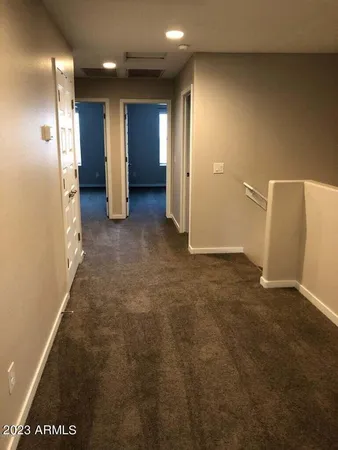 a view of a hallway with some storage