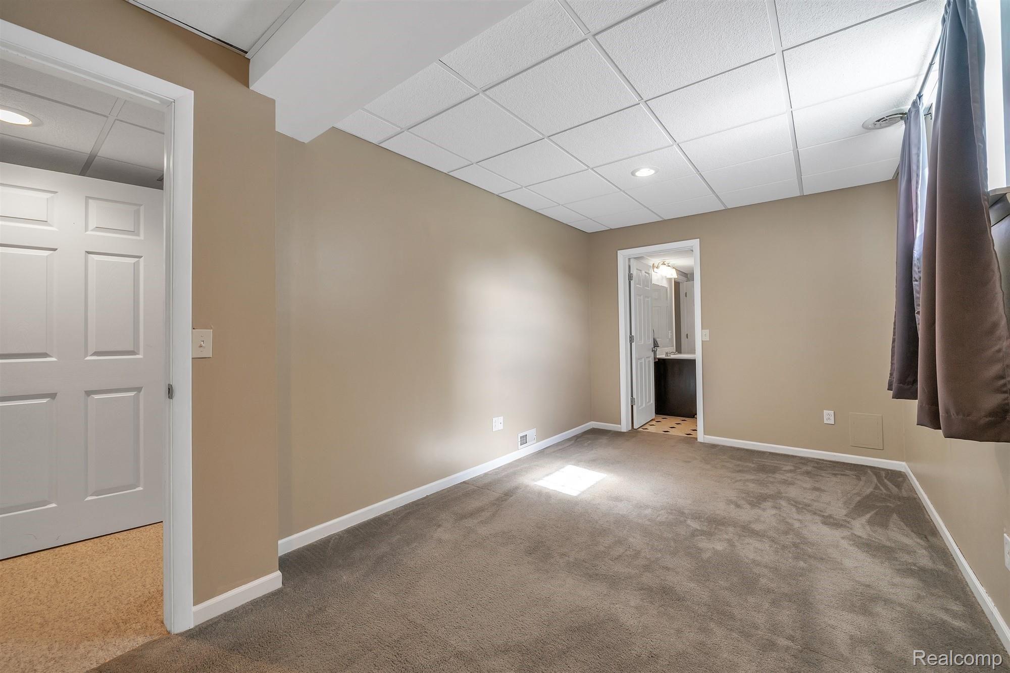 2679 Ravineside South Howell, MI 48843 - Photo 36 of 48 Basement bedroom