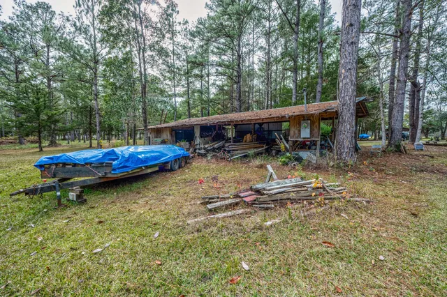 a backyard of a house with lots of green space