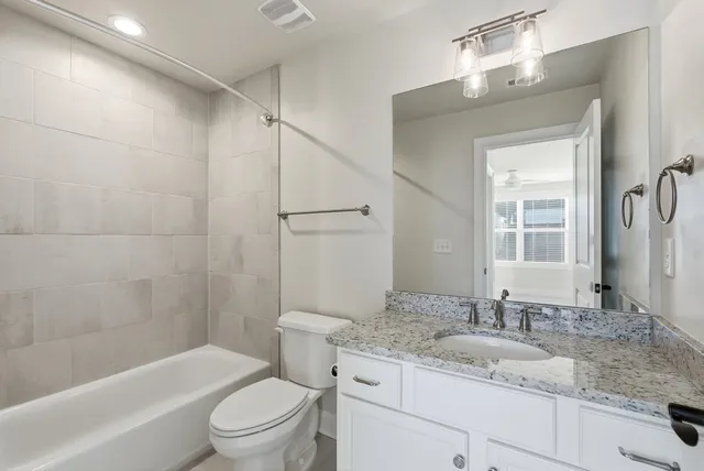 a front view of a house with garage