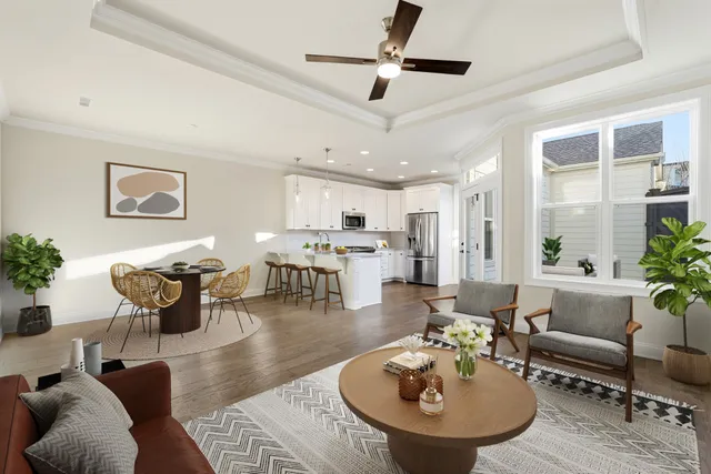 a view of kitchen with furniture and wooden floor
