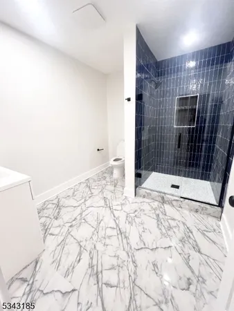 a bathroom with a sink and a shower