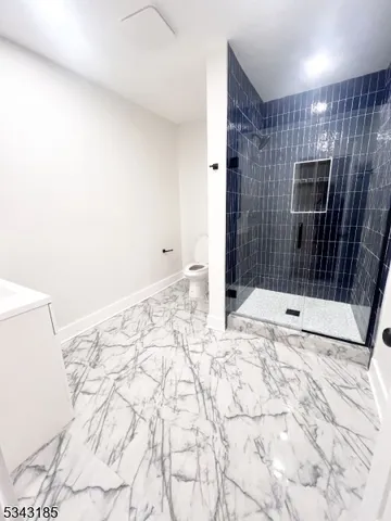 a bathroom with a sink and a shower