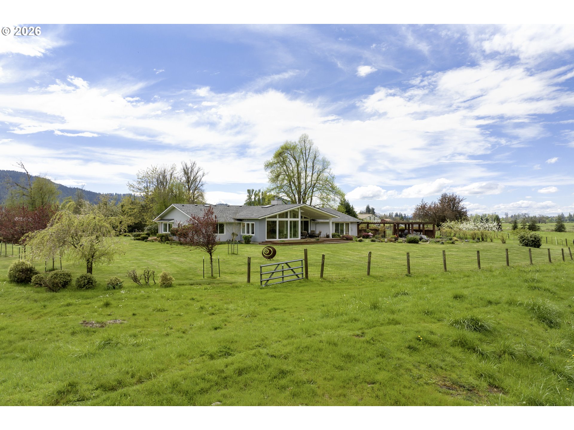 7924 Thurston Road Springfield, OR 97478 - Photo 36 of 45 a view of grassy field with benches