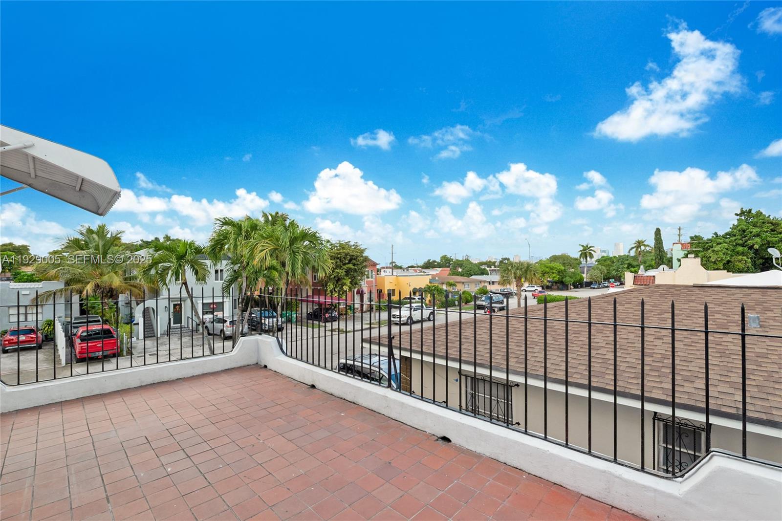 1736 Southwest 9th Street, Unit 1738 Miami, FL 33135 - Photo 13 of 15 a view of a balcony with many windows