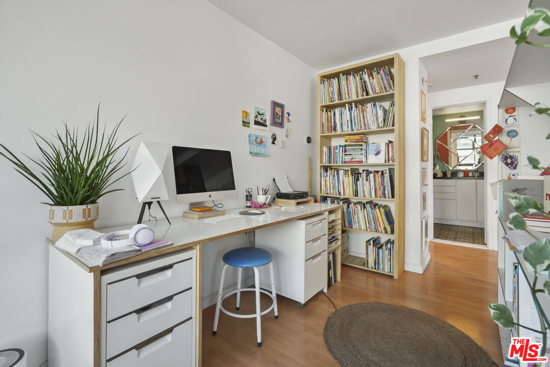 880 West 1st Street, Unit 604 Los Angeles, CA 90012 - Photo 22 of 60 a view of a workspace with furniture