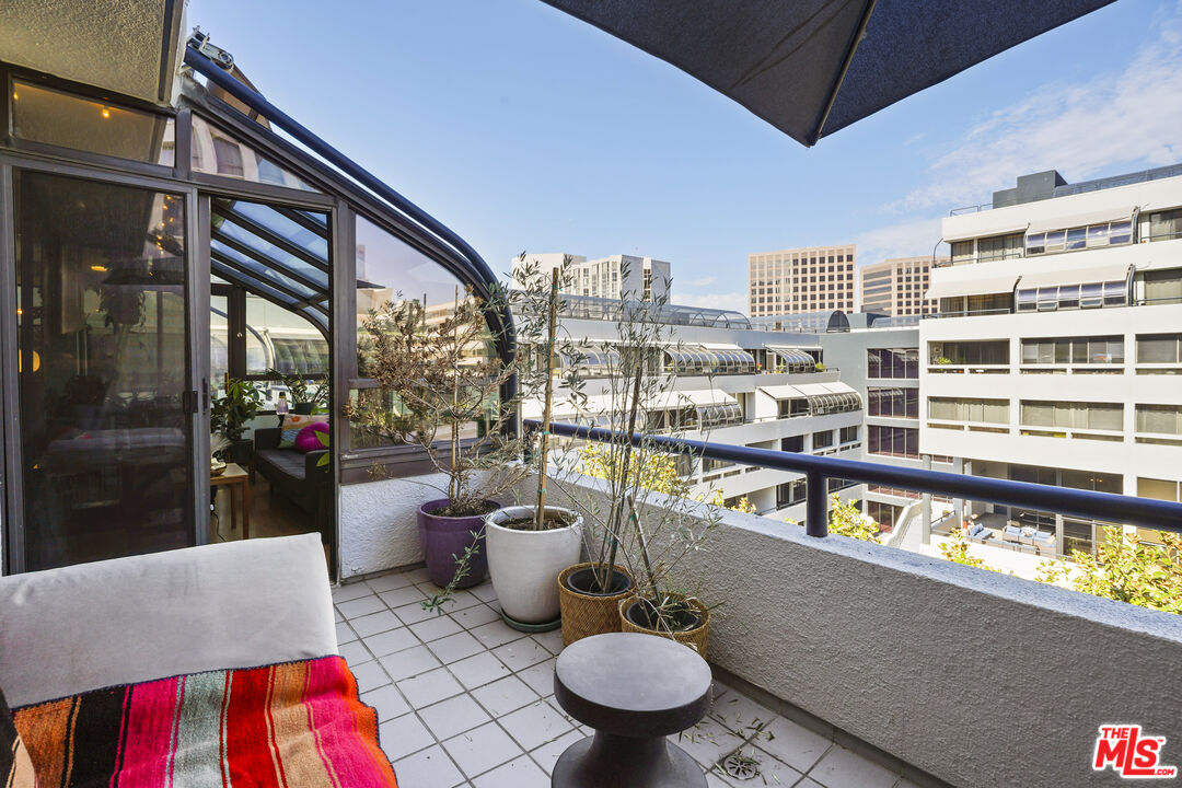 880 West 1st Street, Unit 604 Los Angeles, CA 90012 - Photo 30 of 60 a living room with furniture