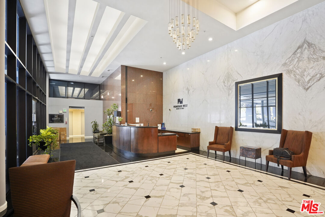 880 West 1st Street, Unit 604 Los Angeles, CA 90012 - Photo 47 of 60 a living room with furniture