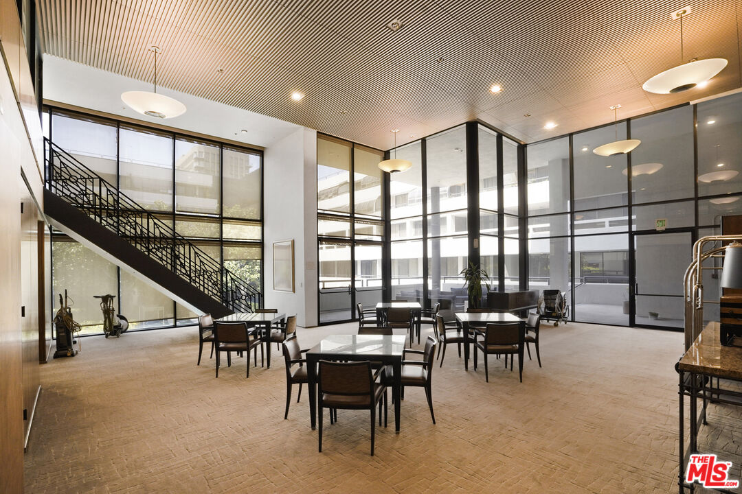 880 West 1st Street, Unit 604 Los Angeles, CA 90012 - Photo 48 of 60 a lobby with furniture and floor to ceiling window