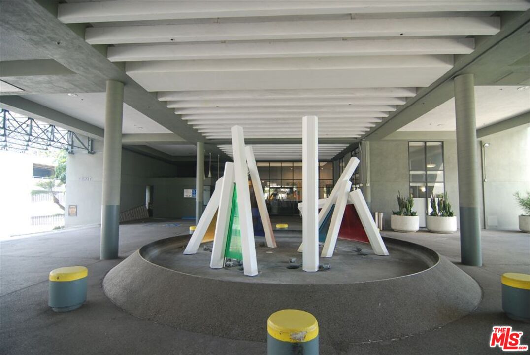 880 West 1st Street, Unit 604 Los Angeles, CA 90012 - Photo 57 of 60 a view of a room with gym equipment