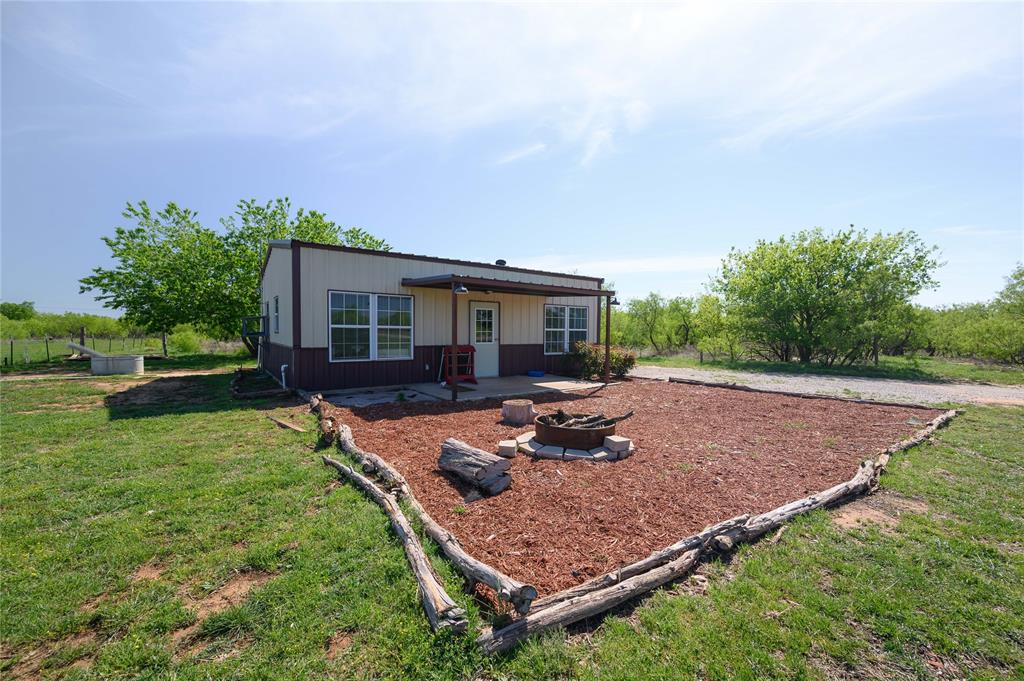 383 Soaring Eagle Trail Wichita Falls, TX 76310 - Photo 6 of 36 Barndominium with Lovely Landscaping
