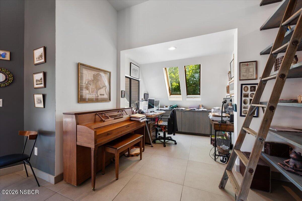1012 Upper Los Berros Road Nipomo, CA 93444 - Photo 14 of 67 a view of a workspace with furniture and a window