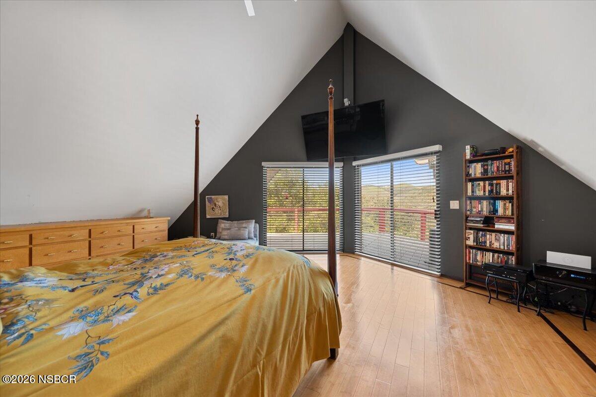 1012 Upper Los Berros Road Nipomo, CA 93444 - Photo 17 of 67 a bedroom with a bed and a flat tv screen