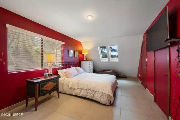 a view of a road with a mountain in the background