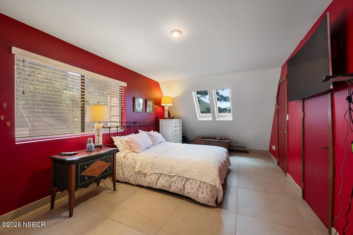 1012 Upper Los Berros Road Nipomo, CA 93444 - Photo 24 of 67 a bedroom with a bed and a window