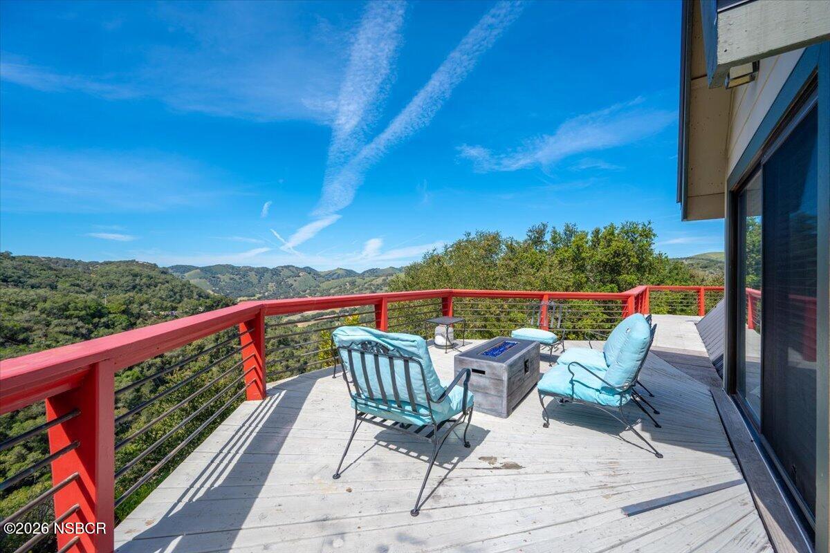 1012 Upper Los Berros Road Nipomo, CA 93444 - Photo 39 of 67 a view of a chair and tables on the balcony