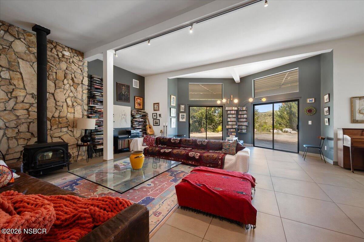 1012 Upper Los Berros Road Nipomo, CA 93444 - Photo 5 of 67 a living room with furniture and a fireplace