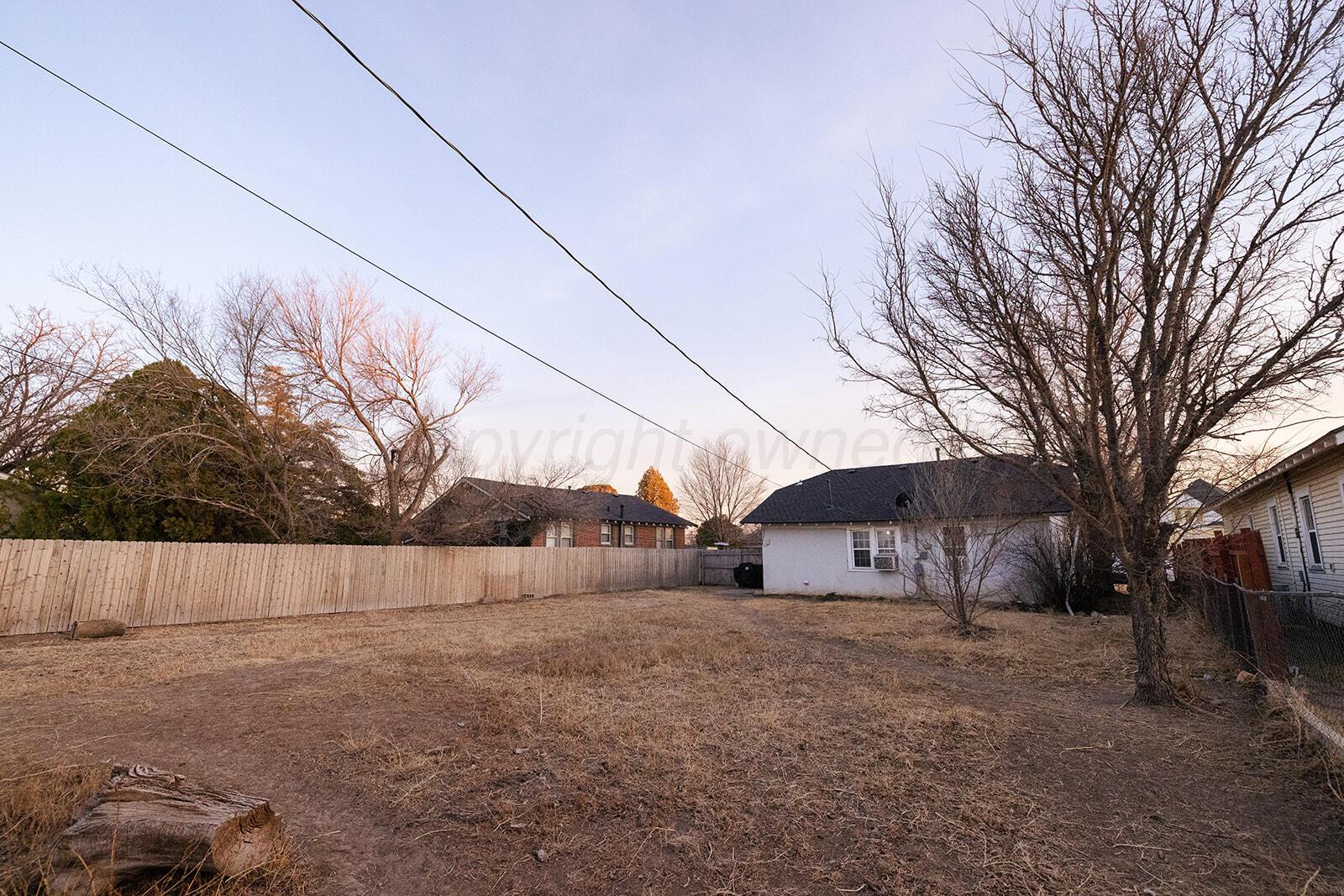 2003 5th Avenue Canyon, TX 79015 - Photo 17 of 19 a view of a house with a yard covered in snow