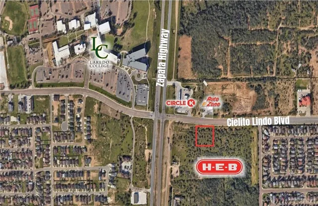 a street sign on a wall next to a building