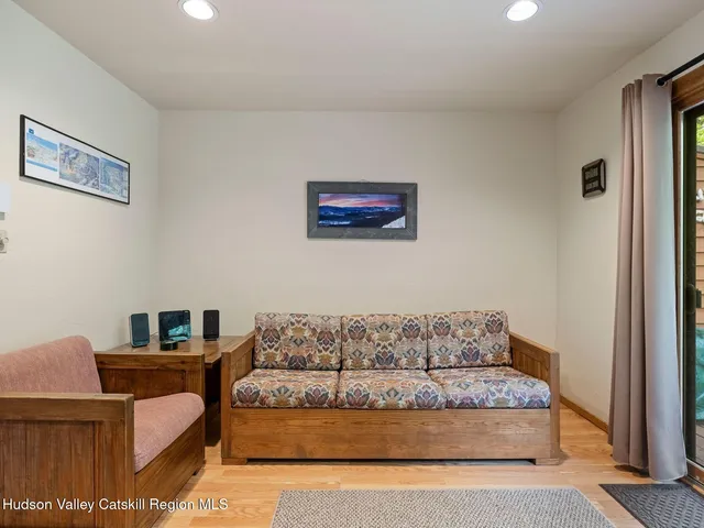 a living room with furniture and a couch