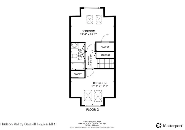 a picture of a bench in front of a white house