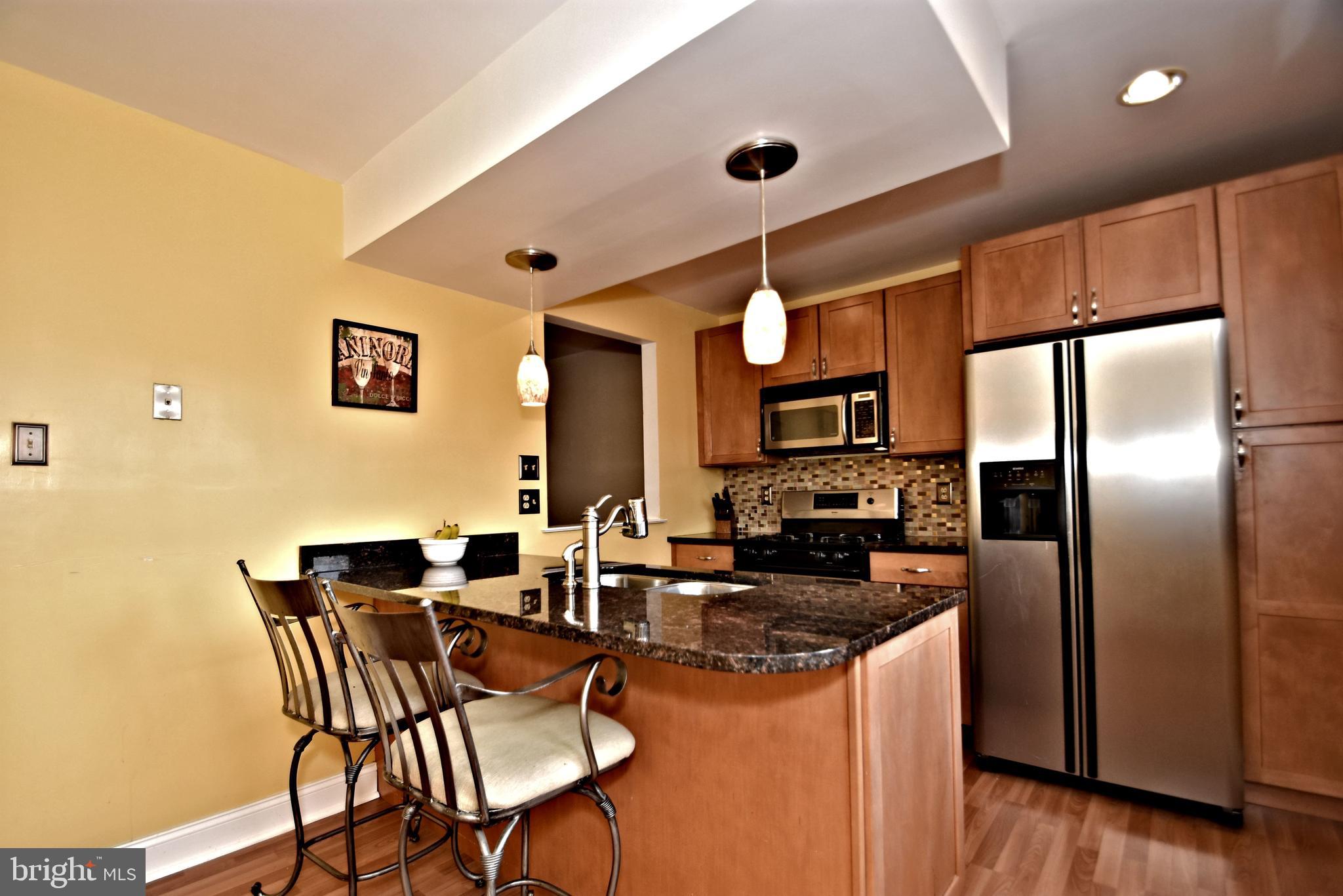 7431 Hill Road Philadelphia, PA 19128 - Photo 11 of 31 Kitchen with granite counters