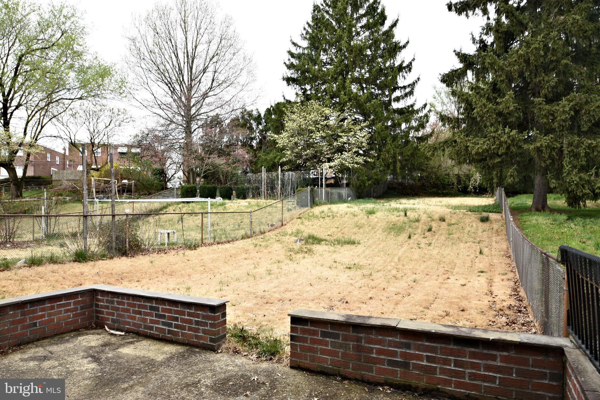 7431 Hill Road Philadelphia, PA 19128 - Photo 31 of 31 Rear patio and fenced yard