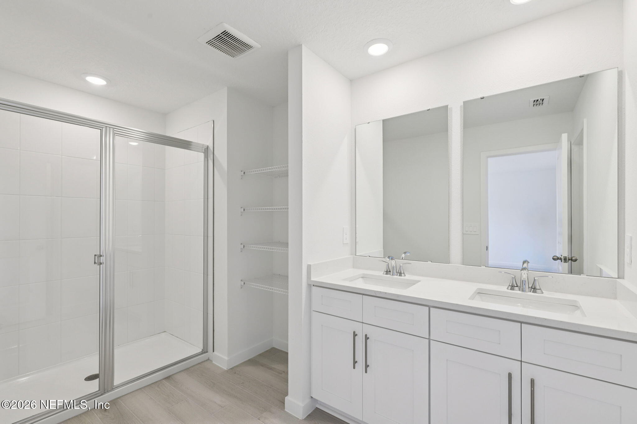 25 Rangeline Drive St. Augustine, FL 32092 - Photo 40 of 43 a bathroom with double sink and a mirror