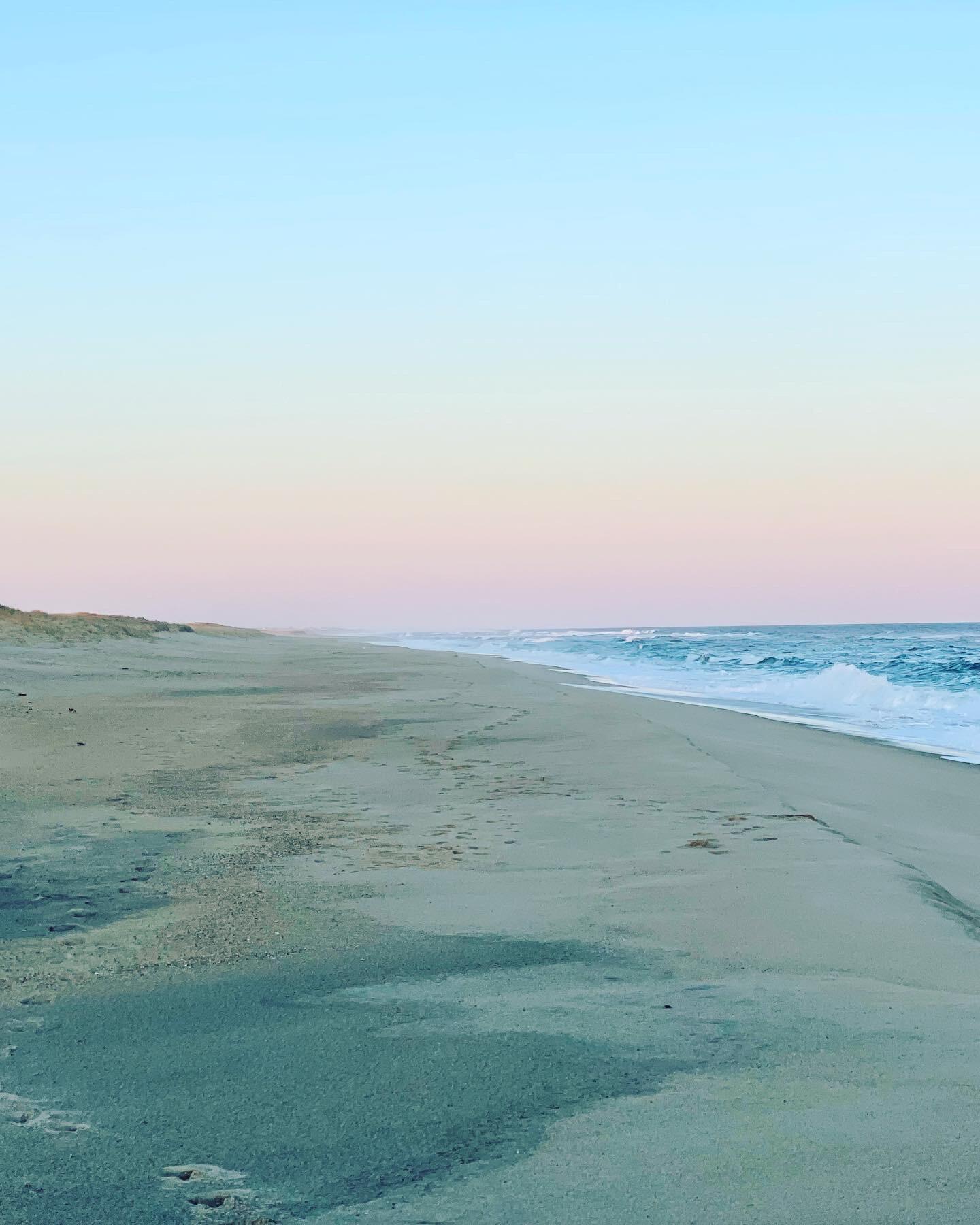 0 Beach Chilmark Ma Chilmark, MA 02535 - Photo 2 of 21 a view of an ocean beach and mountain