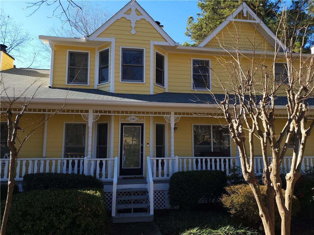 2342 Brockett Road Tucker, GA 30084 - Photo 1 of 1 a front view of a house with a yard