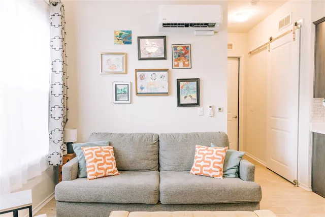 a living room with furniture and a couch