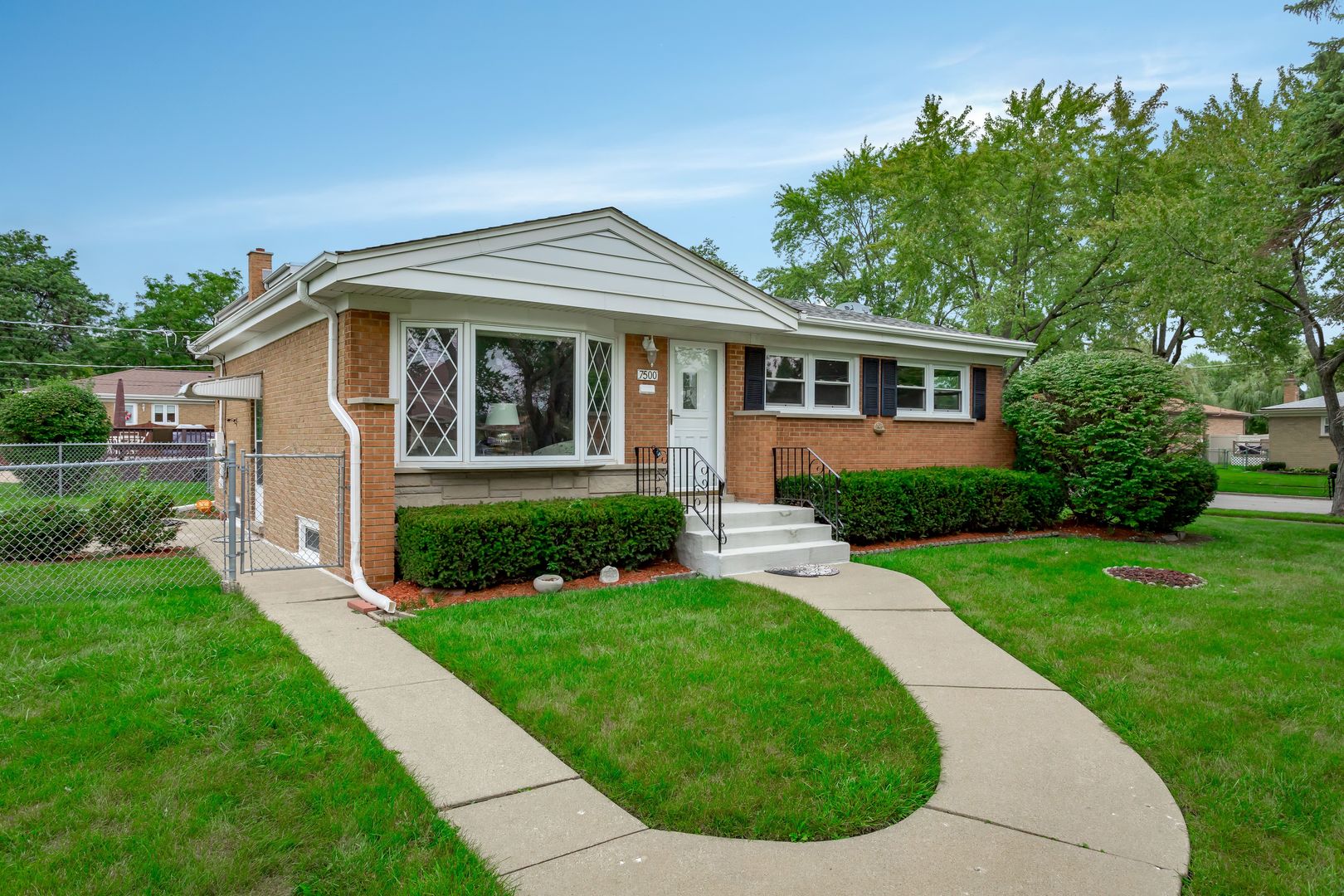 7500 Beckwith Road Morton Grove, IL 60053 - Photo 1 of 27 a front view of a house with a yard