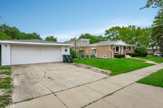 7500 Beckwith Road Morton Grove, IL 60053 - Photo 26 of 27 a front view of house with yard
