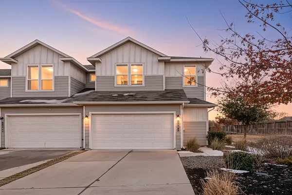 front view of a house with a garage