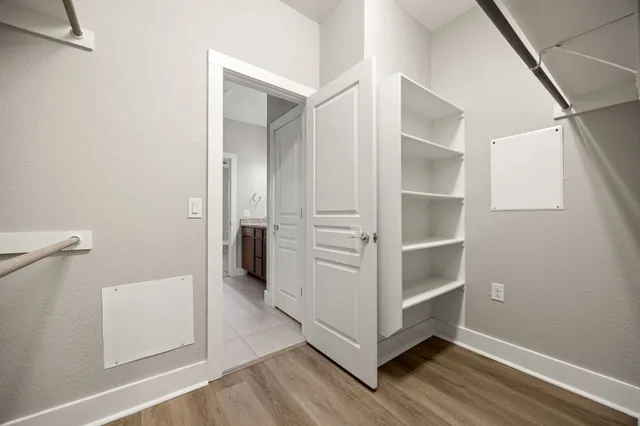 a view of an empty walk in closet
