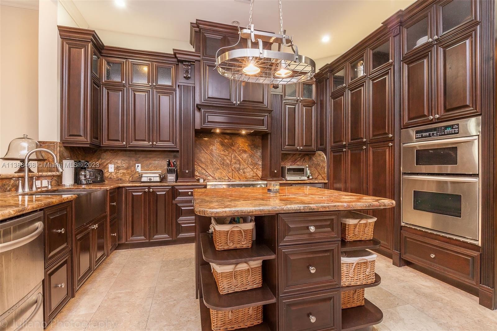 6874 Southwest 57th Terrace Miami, FL 33143 - Photo 11 of 36 a kitchen with a stove and a refrigerator