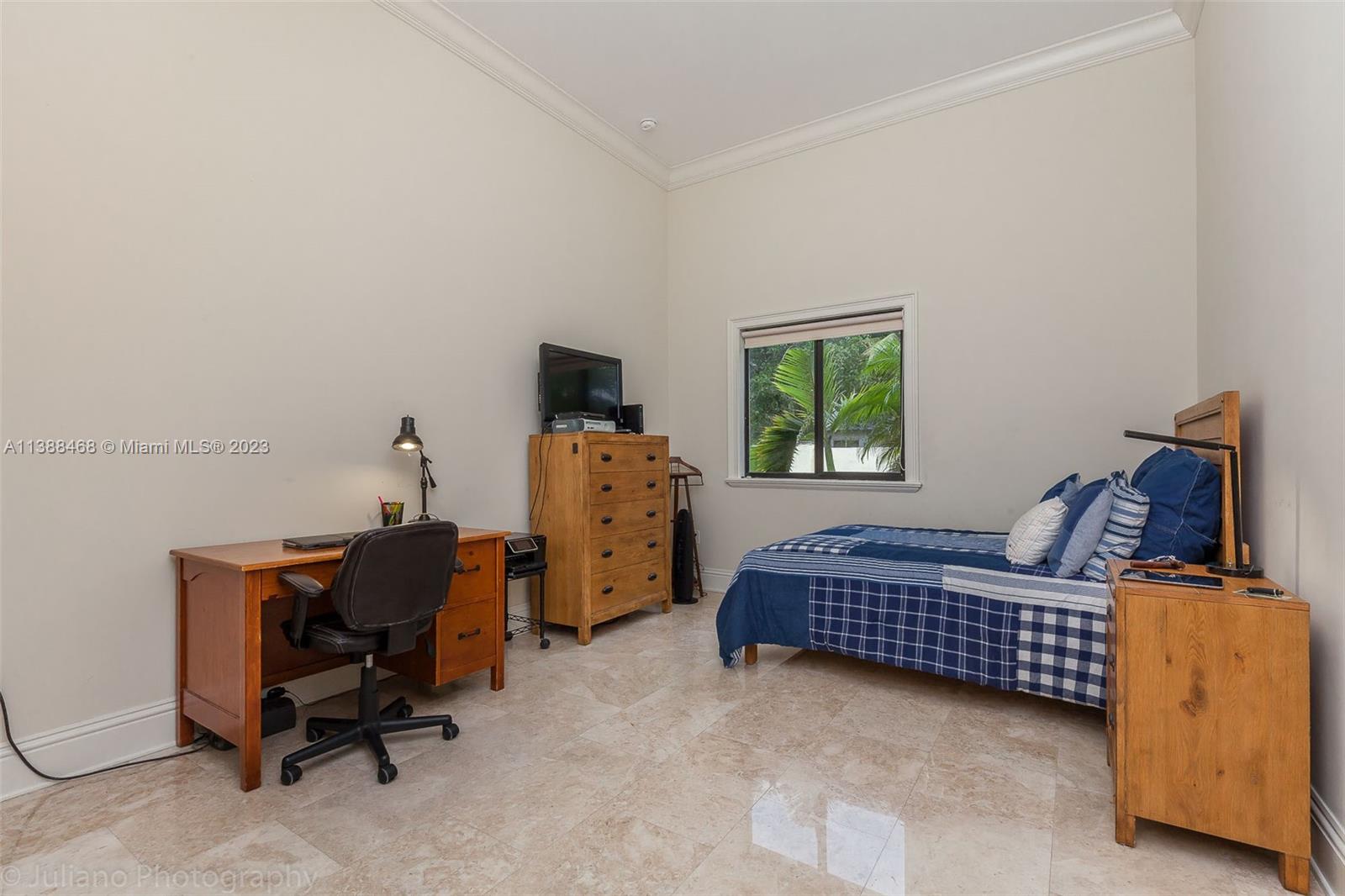 6874 Southwest 57th Terrace Miami, FL 33143 - Photo 23 of 36 a living room with furniture and a window
