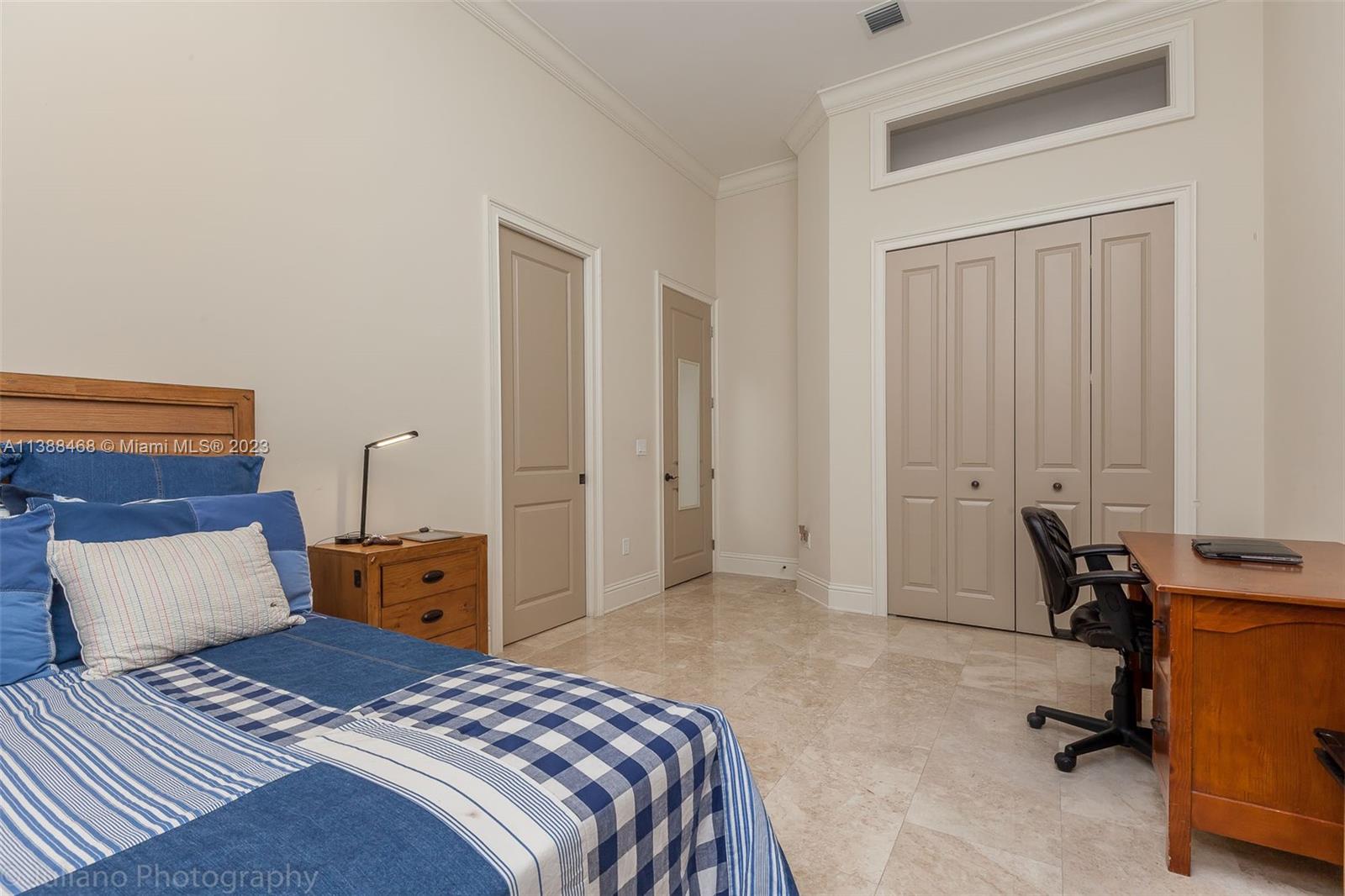 6874 Southwest 57th Terrace Miami, FL 33143 - Photo 24 of 36 a bedroom with a bed and furniture