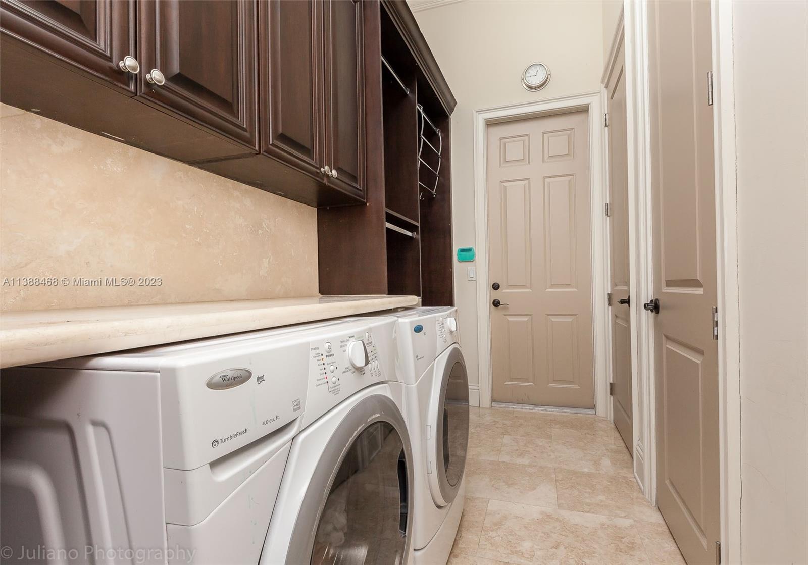6874 Southwest 57th Terrace Miami, FL 33143 - Photo 29 of 36 a view of washer and dryer