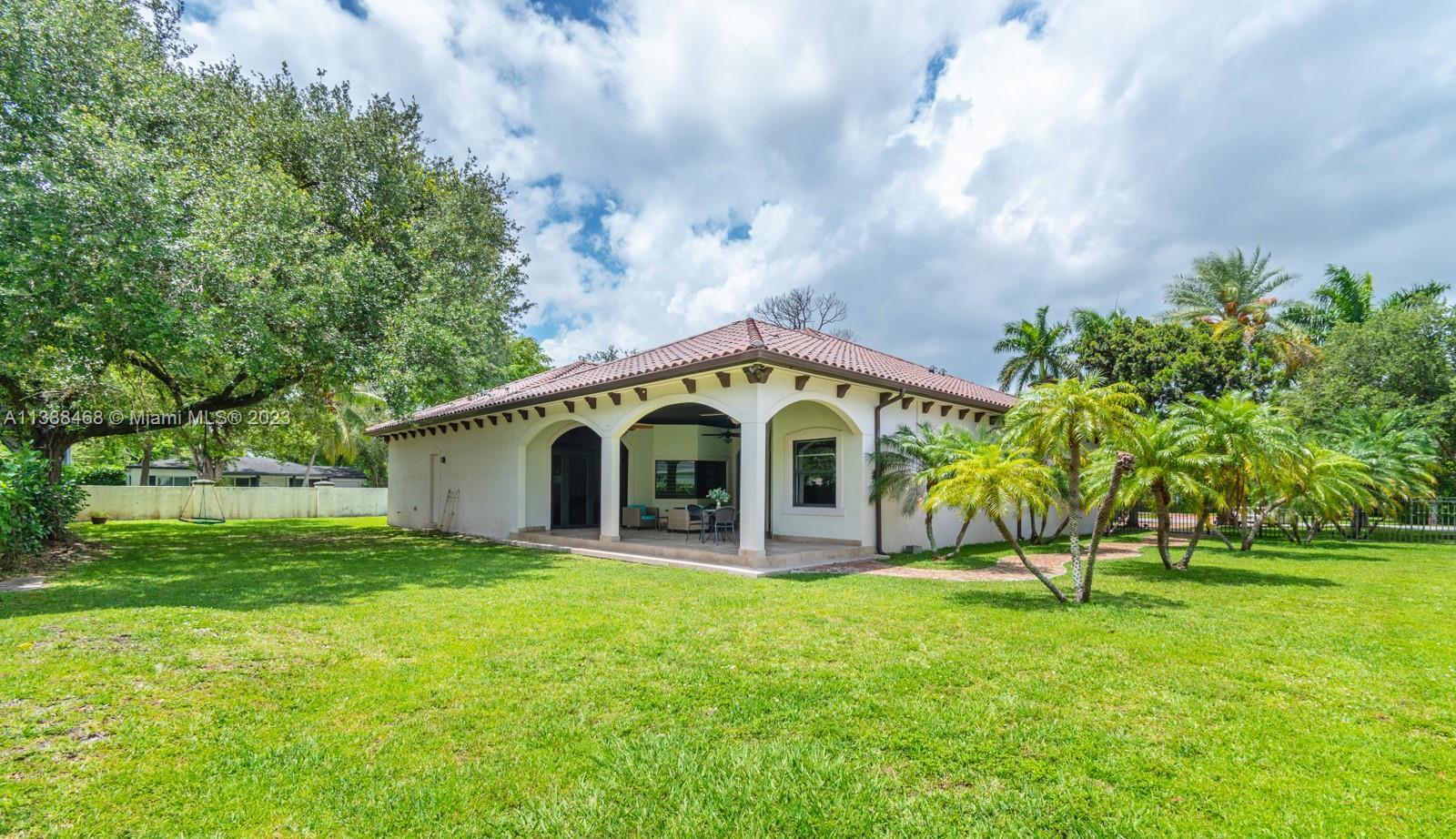 6874 Southwest 57th Terrace Miami, FL 33143 - Photo 31 of 36 a view of a house with a yard
