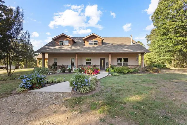a front view of a house with porch