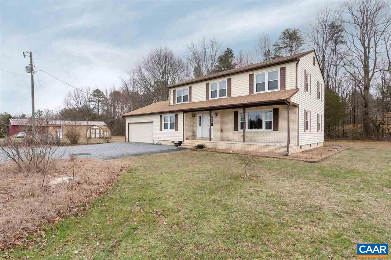 706 Zion Road Zion Crossroads, VA 22942 - Photo 2 of 38 a front view of a house with a yard