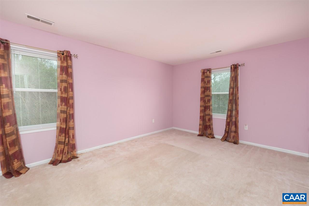 706 Zion Road Zion Crossroads, VA 22942 - Photo 28 of 38 an empty room with windows